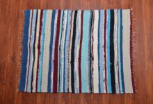 Photo of Полосатый танкини с кружевными вставками